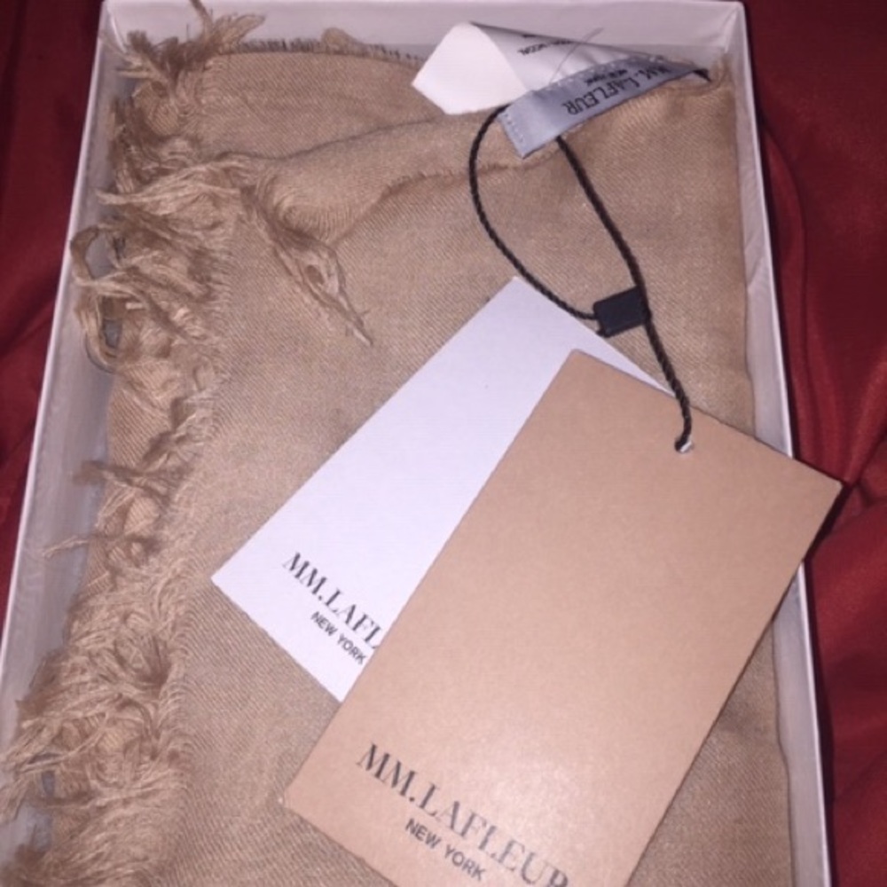 Beautiful brand new blush colored scarf